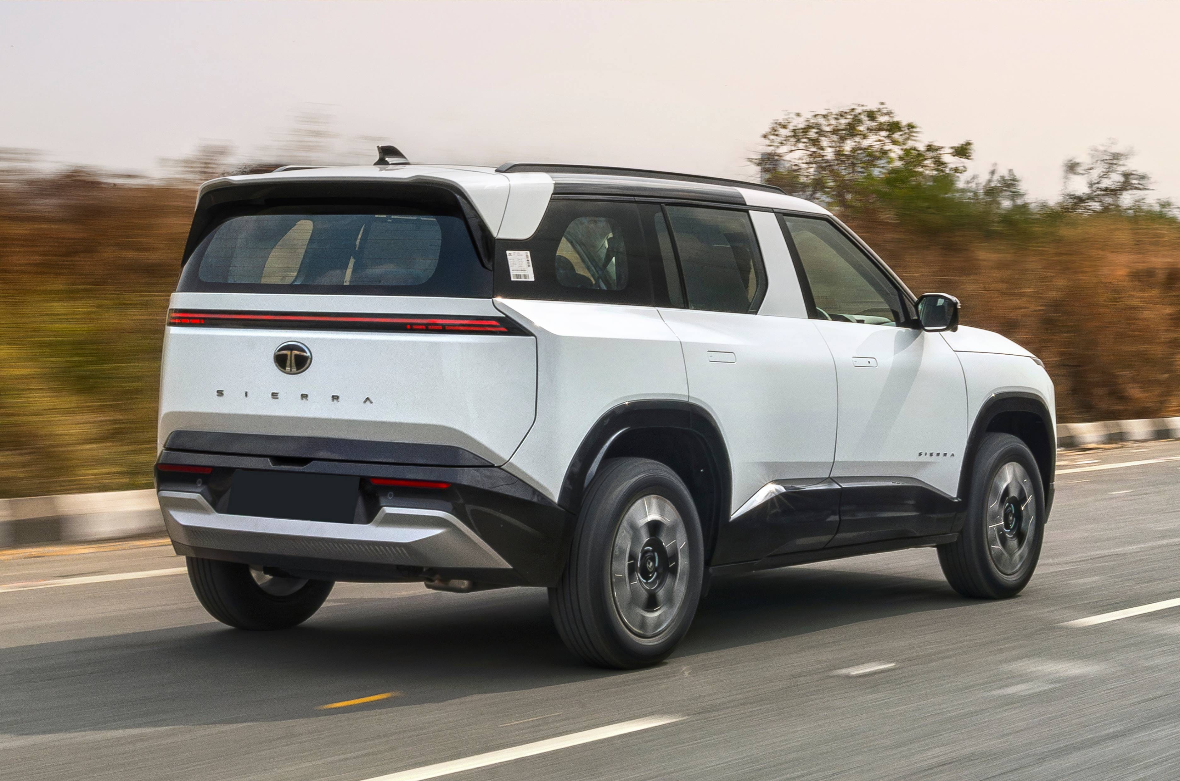 Tata Sierra 1.5 petrol rear right side driving on road