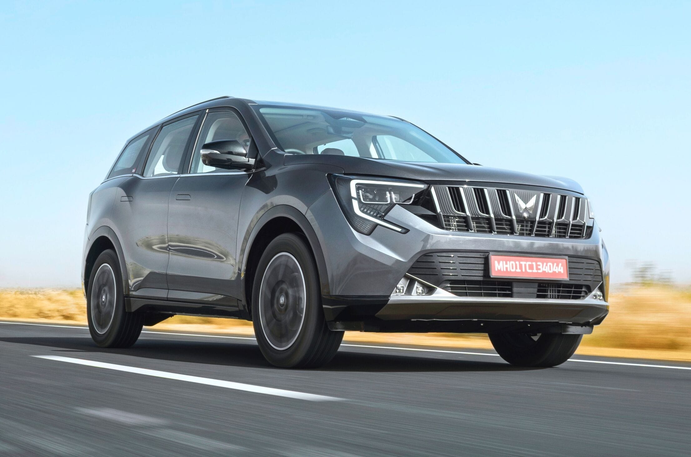 Mahindra XUV 7XO front right side driving on road