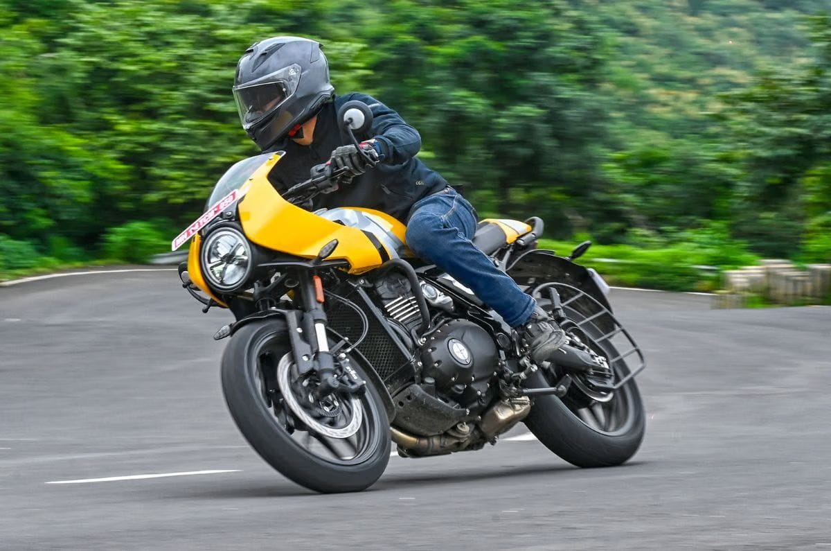 Triumph Thruxton 400 front left side cornering shot on road