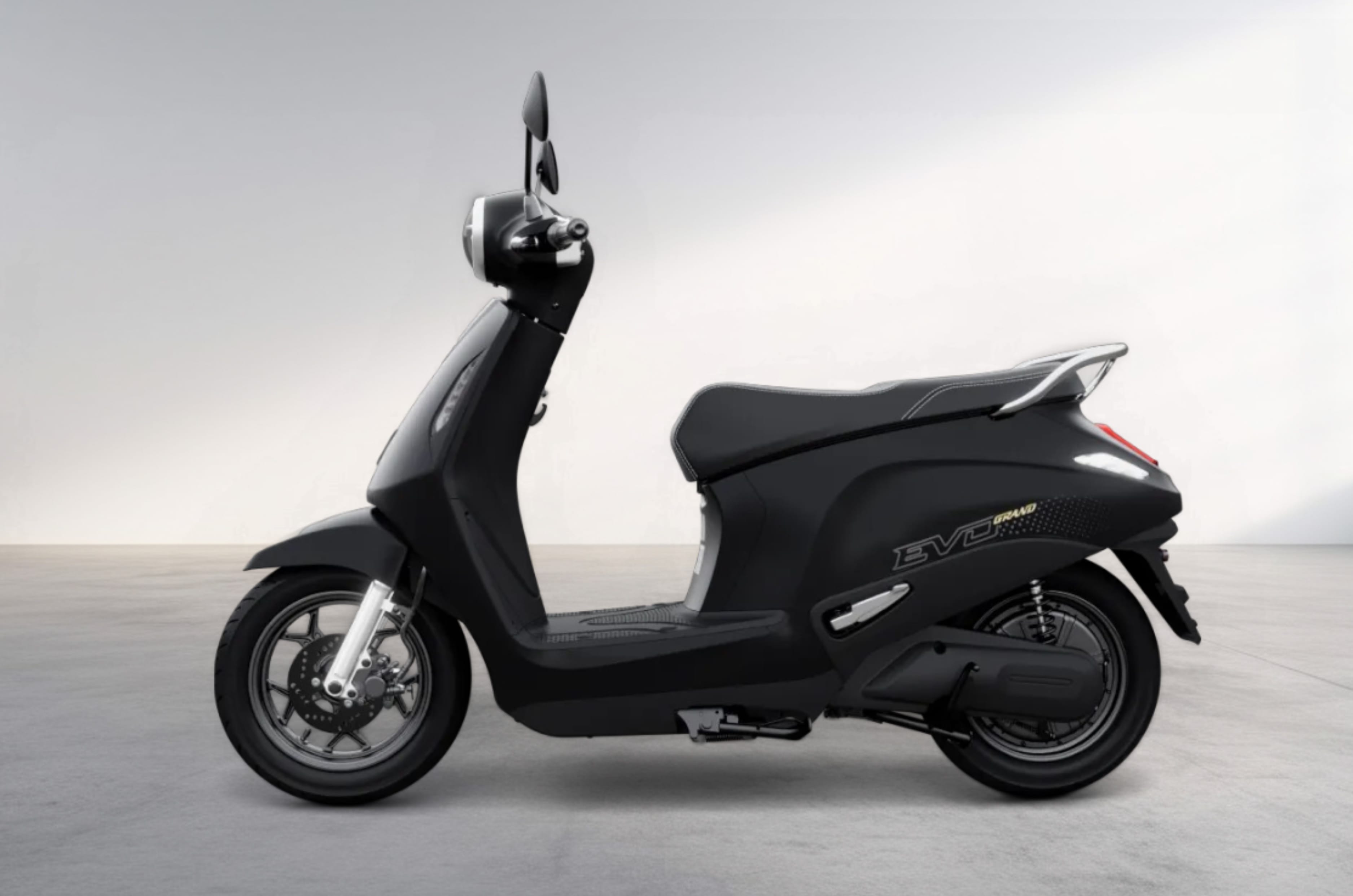 Vinfast Evo Grand left side profile static in studio