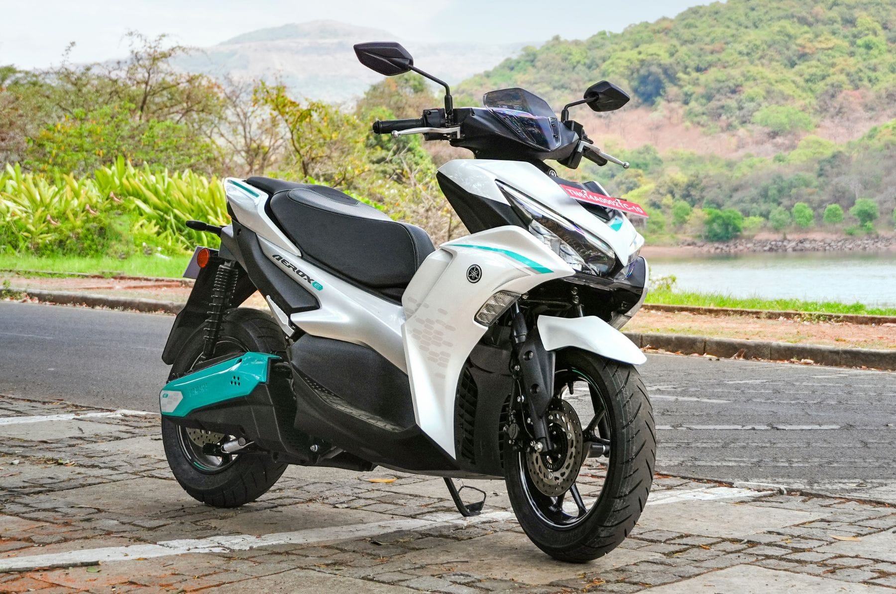 Yamaha Aerox E front right side static in field