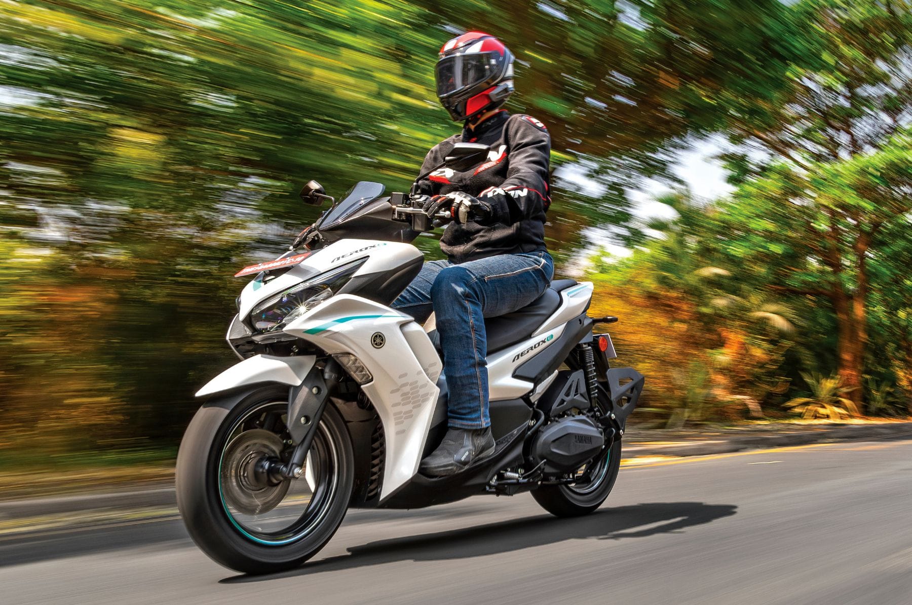 Yamaha Aerox E front left side static on road