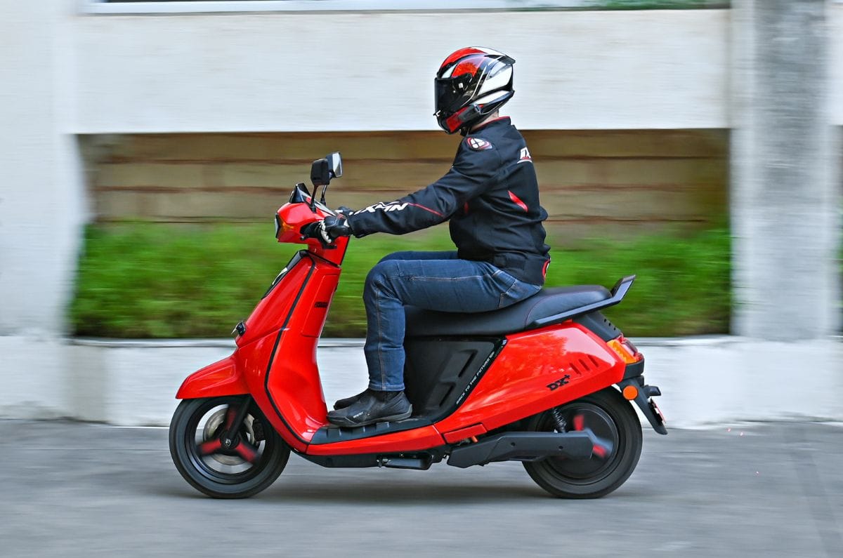 Kinetic DX left side profile riding shot