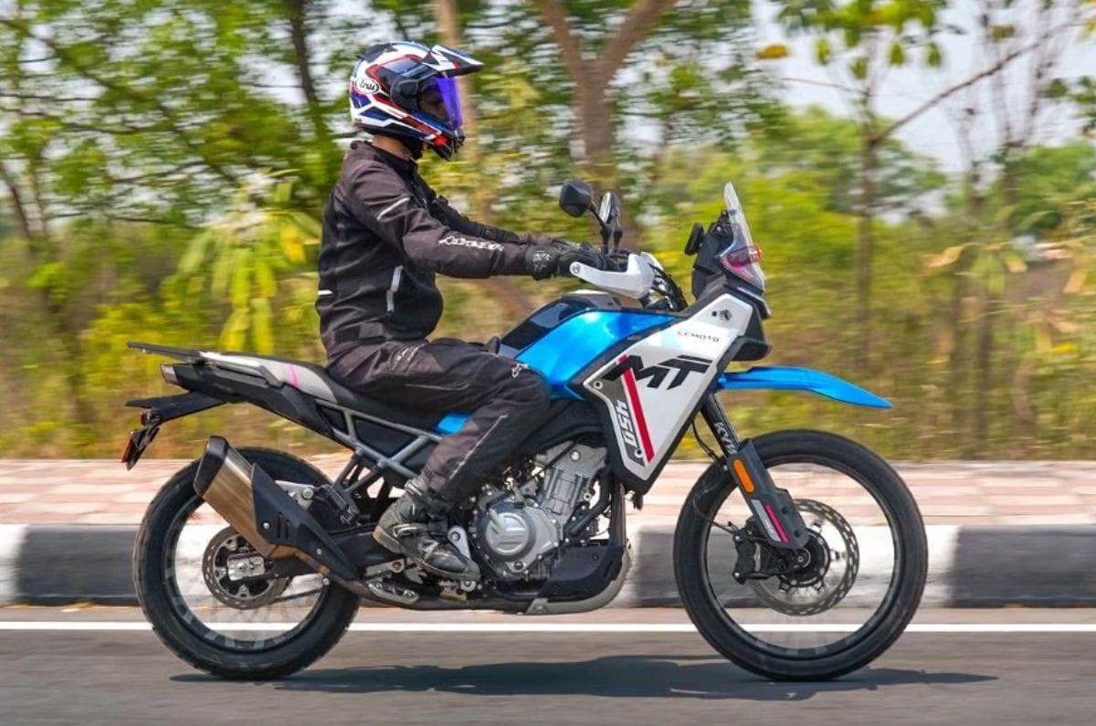 CFmoto 450 MT right side profile riding shot on road