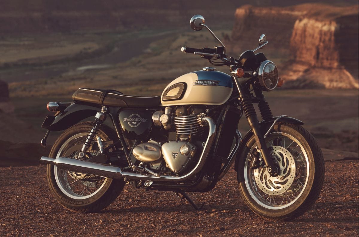 Triumph Bonneville T120 front right side static in mountains
