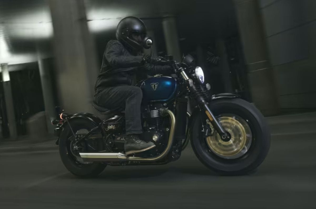 Triumph Bonneville Bobber front right side riding shot on road
