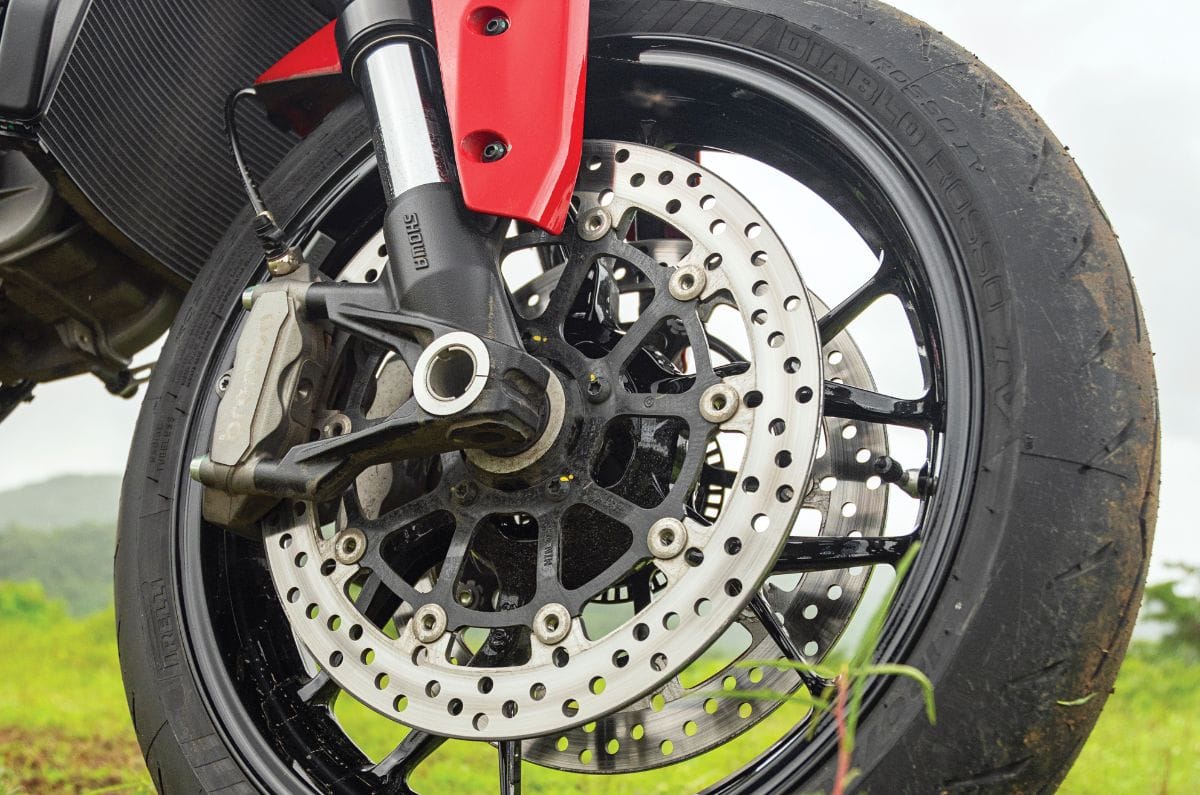 A close up outside shot of the Ducati Monster V2's front M4.32 brake calipers
