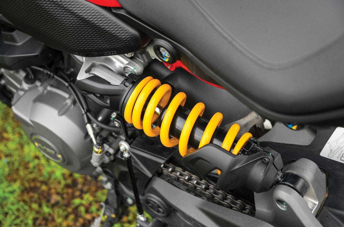 A close up, outside shot of the Ducati Monster V2's rear suspension