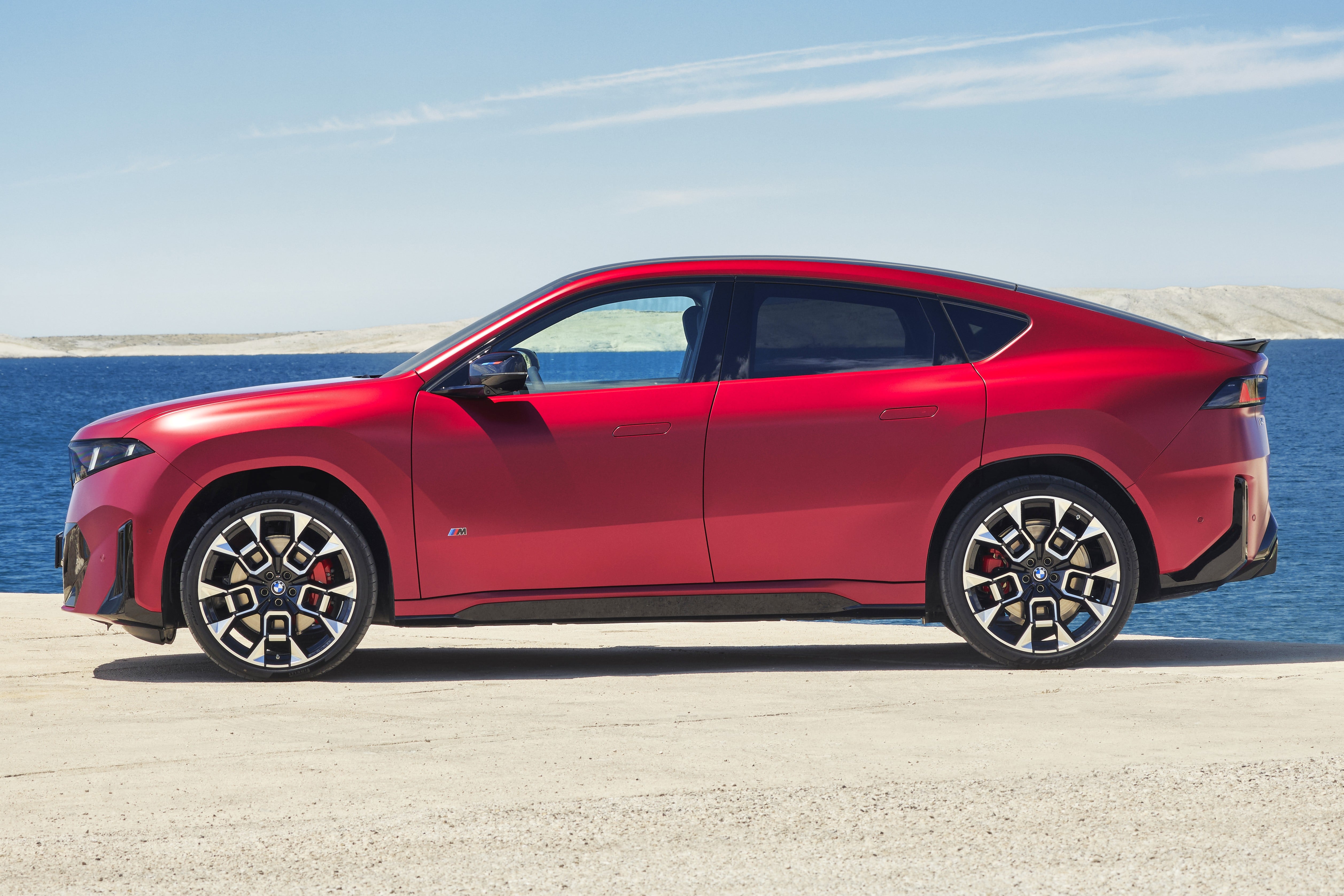 BMW iX4 electric coupe SUV revealed