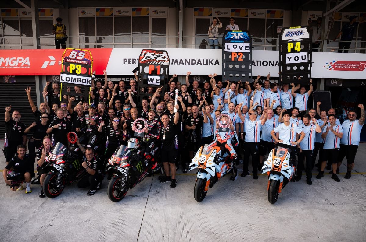Jorge Martin, Marco Bezzecchi, Raul Fernandez and Ai Ogura celebrating the Aprilia 1-2-3-4 with their teams.