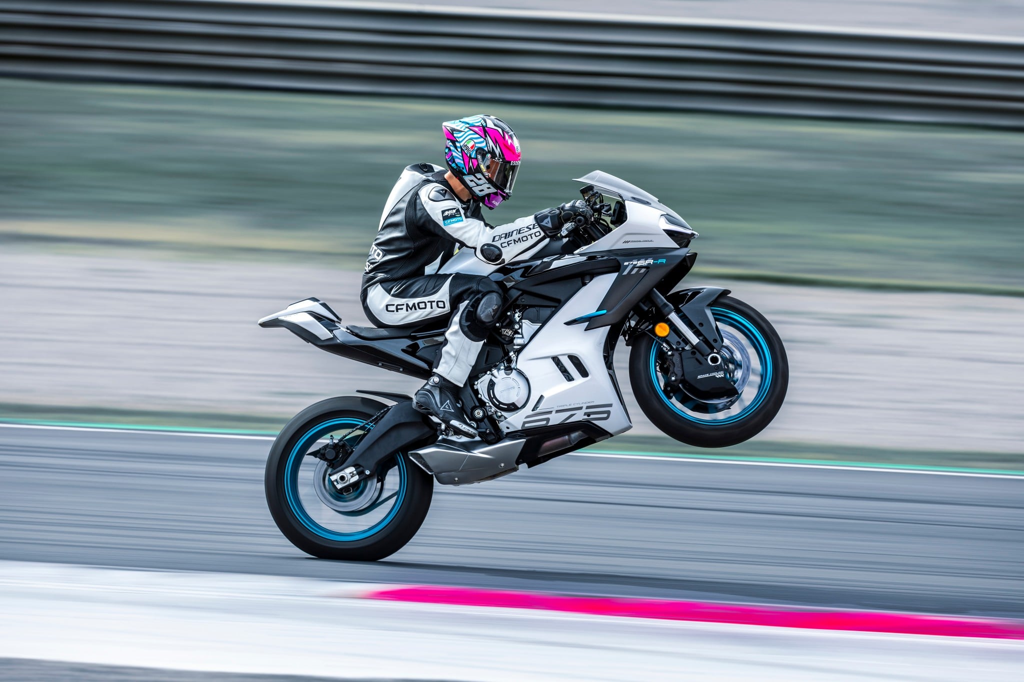 CFMoto 675SR-R at a racetrack.