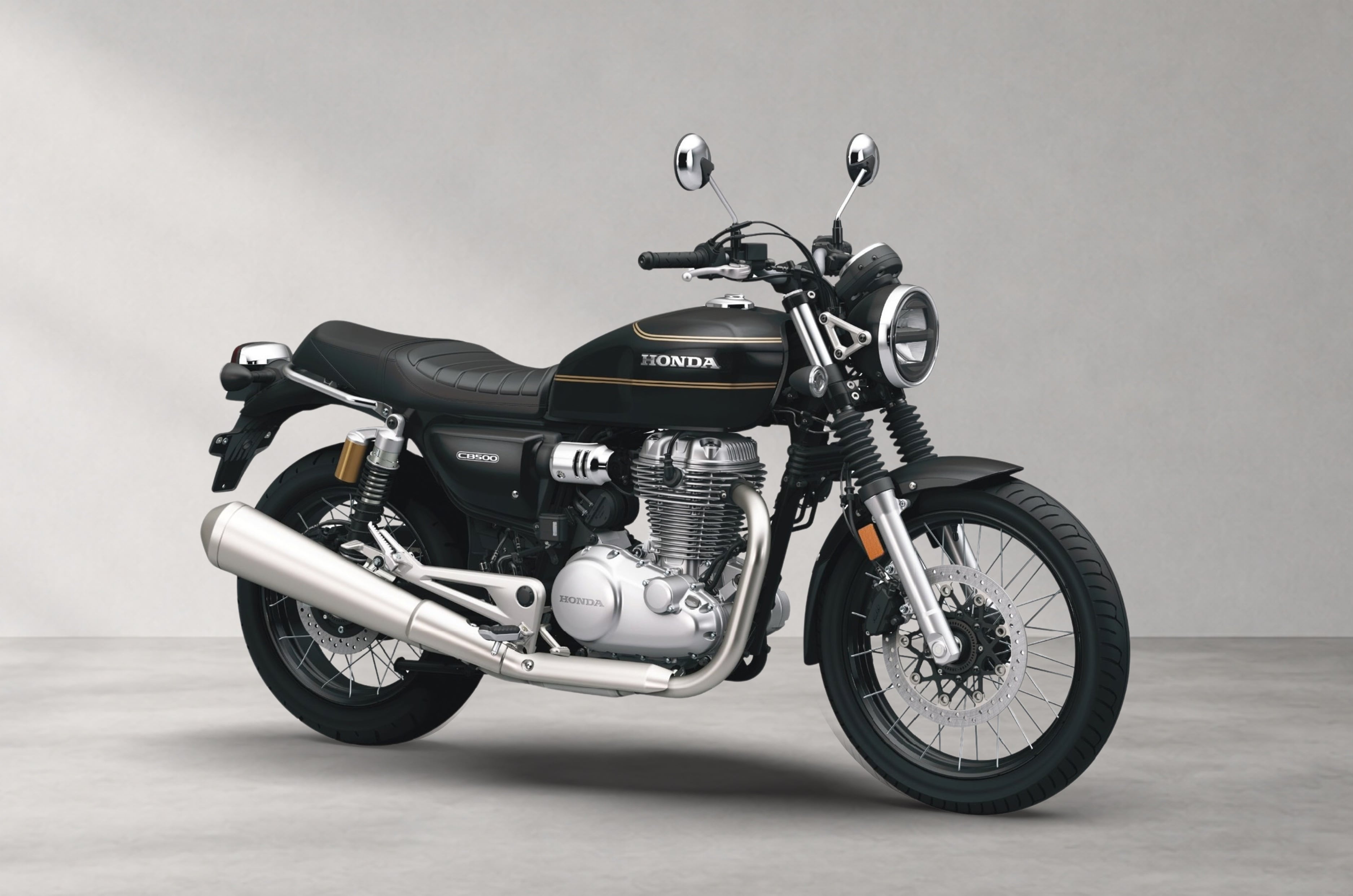 Honda CB500 top variant with tubeless spoke wheels.