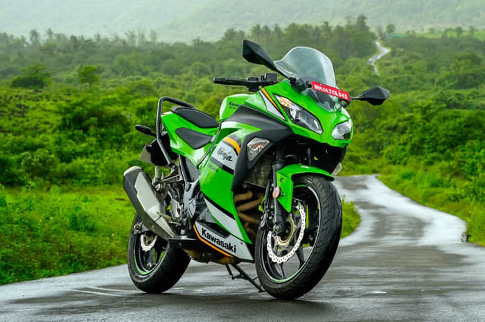 Static image of the Ninja 300 with lush nature behind