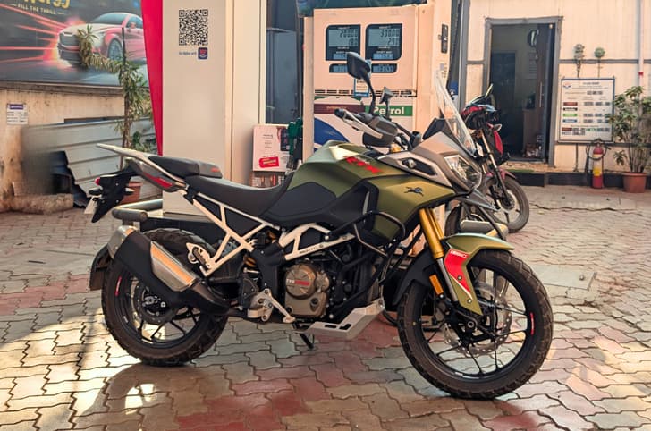 TVS Apache RTX 300 front right static at a petrol pump