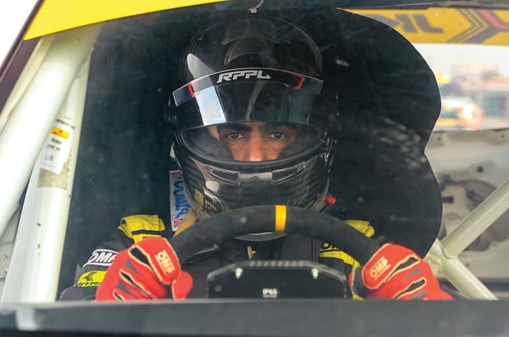 Driver with helmet on