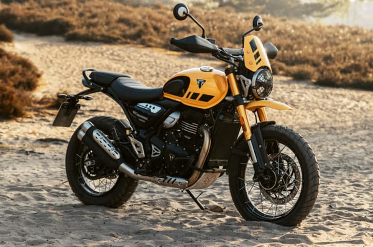 Scrambler 400 XC parked in sand on the beach