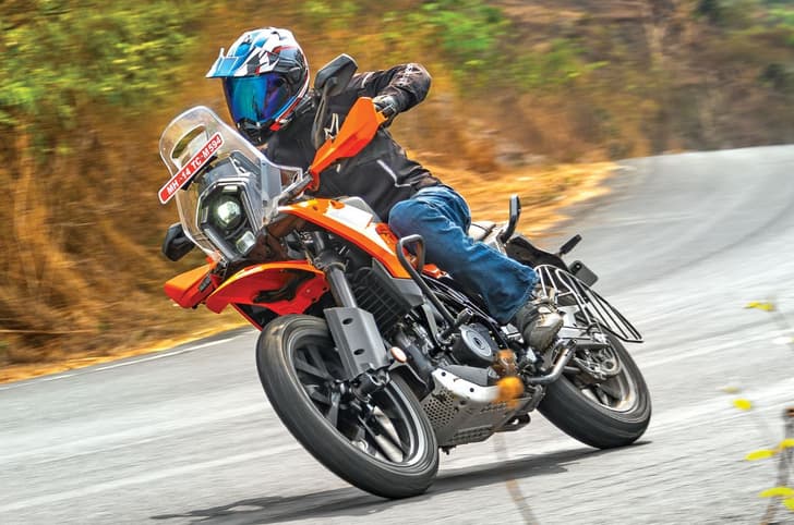 KTM 390 Adventure X cornering shot on tarmac.
