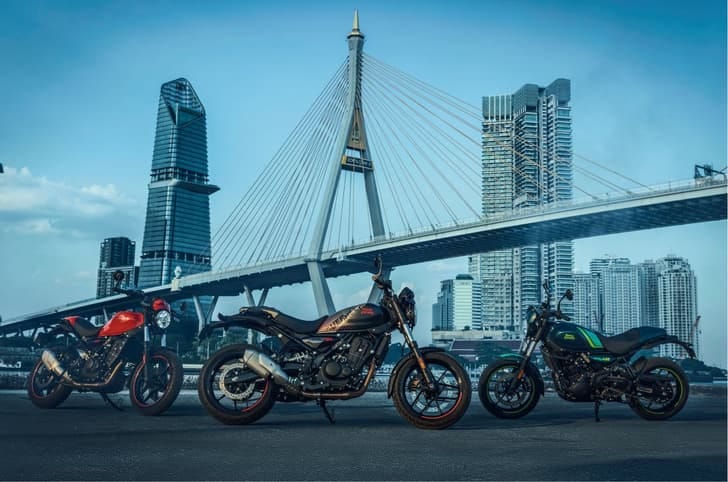 Three Royal Enfield Guerrilla 450 Apex bikes parked side by side