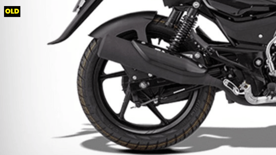 Right close up of the outgoing Pulsar 125's rear wheel showing the suspension