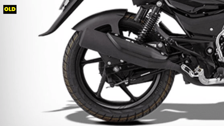 Right close up of the outgoing Pulsar 125's rear wheel showing the suspension