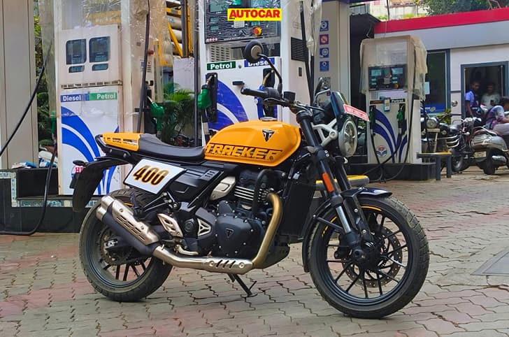 Triumph Tracker 400 at a petrol pump