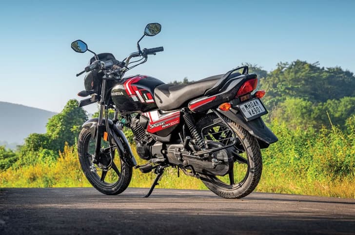 Honda Shine 100 DX rear left side static shot on road
