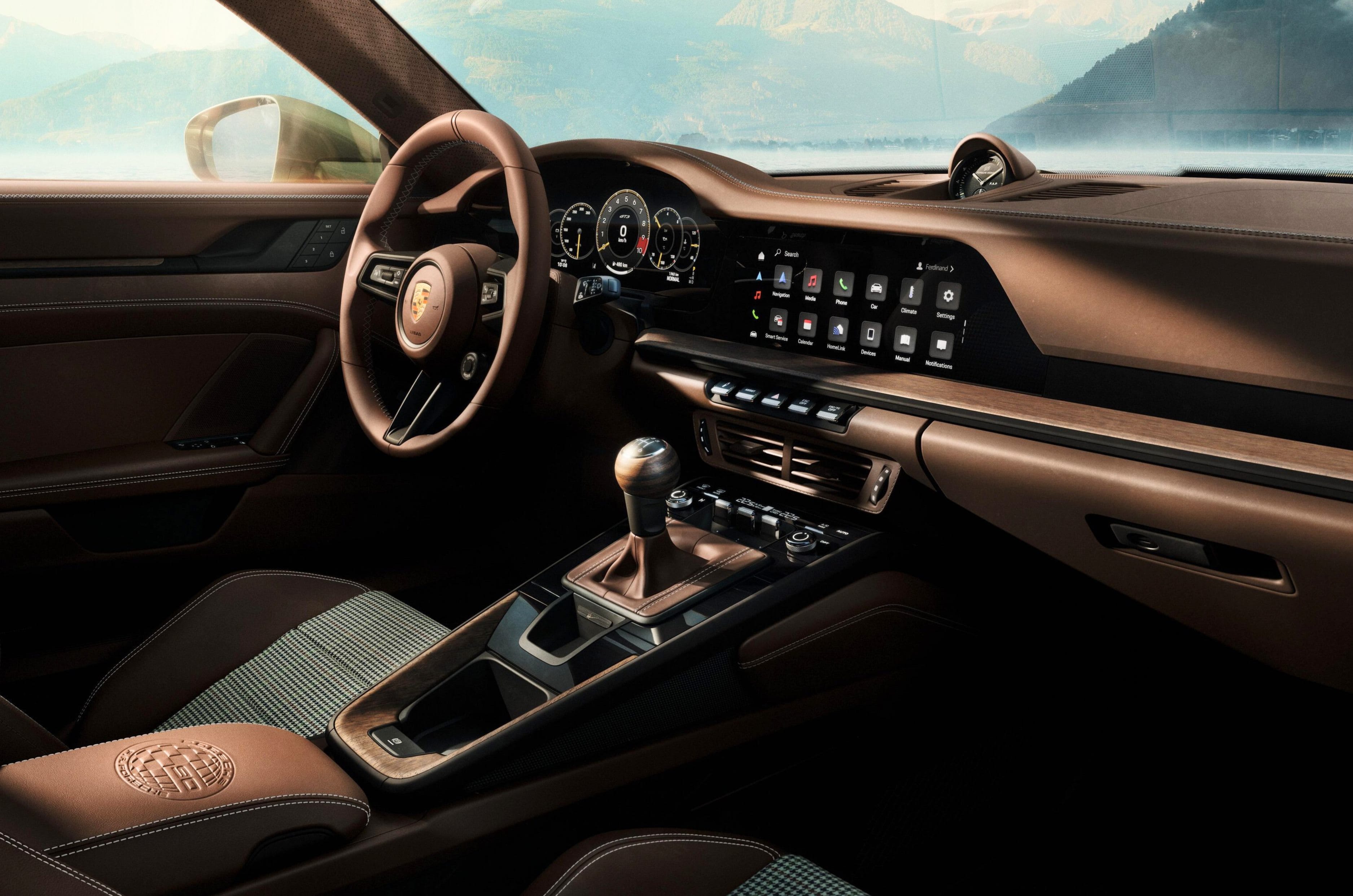 On the inside, it gets Chalk Beige stitching on the Truffle Brown Club Leather upholstery.