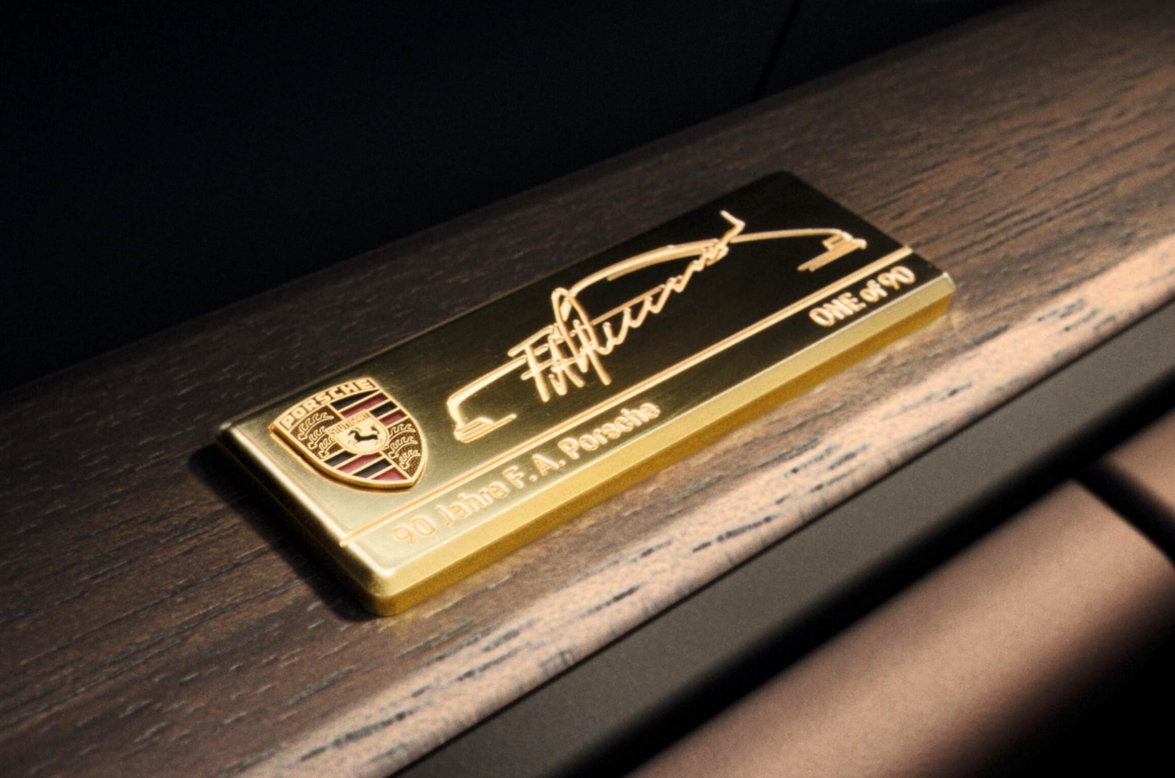 The dashboard features an exclusive gold-plated plaque with F.A.'s signature.