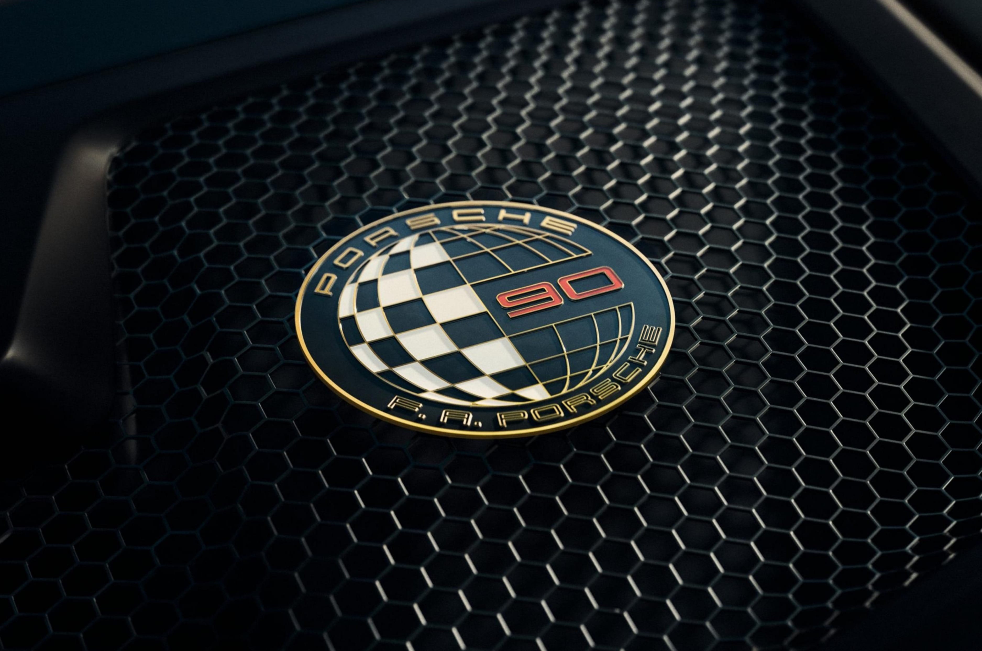 A galvanised gold-plated badge with the ‘90 F. A. Porsche’s logo sits on the grille of the boot lid.