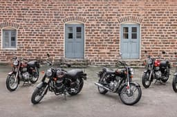 Royal Enfield Bullet 350 all colours parked in parking lot