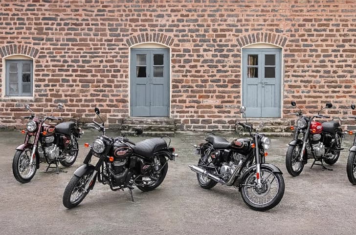 Royal Enfield Bullet 350 all colours parked in parking lot