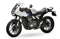 The 398cc, single-cylinder, liquid-cooled engine makes 42hp and 37.5Nm of torque here. Triumph Thruxton 400 white front left side static image in studio
