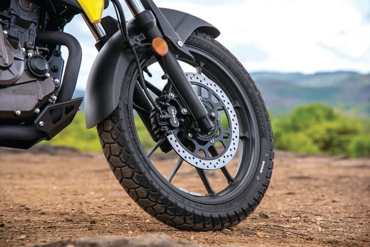 Close up image of the front wheel and tyre of the Suzuki V-Strom SX