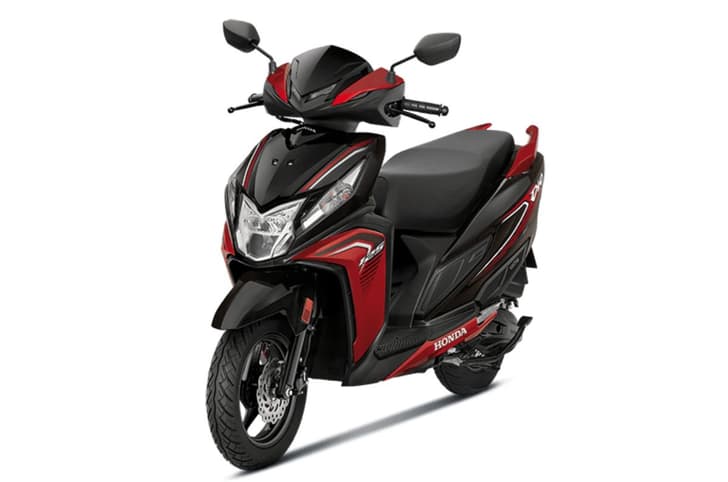 Honda Dio 125 red colour front left static image in studio