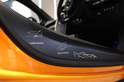 McLaren MCL38 Celebration Edition Artura door sill autographs