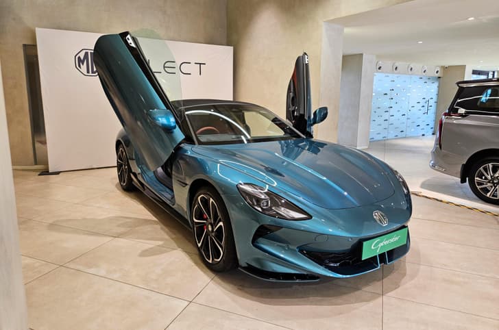 MG Cyberster open doors front quarter static