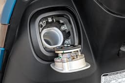 Close up image of the fuel filler cap on the inside of the front apron