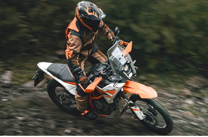 KTM 390 Adventure R front right side riding shot off road from top angle
