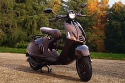 Vespa 946 horse edition scooter front right side static in field