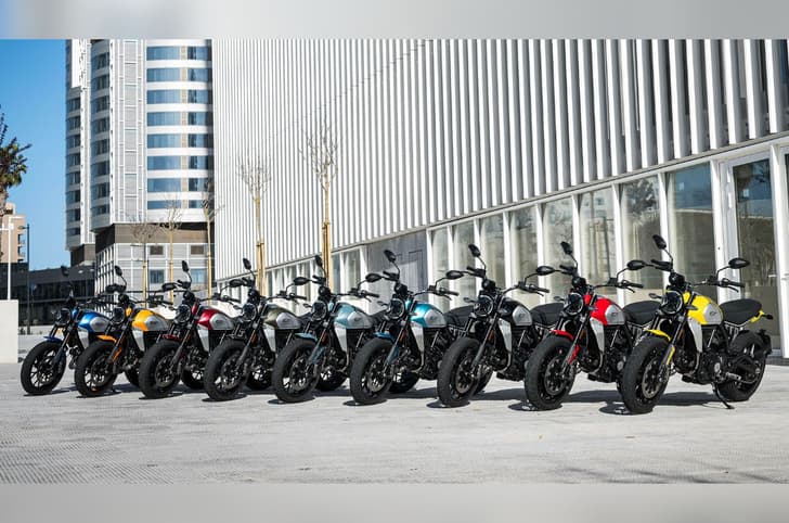 Ducati Scrambler Icon all colours lined up in city centre