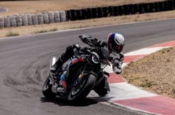 BMW M 1000 R cornering shot on track