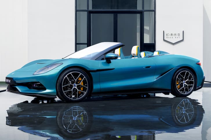 byd denza z convertible in front of building