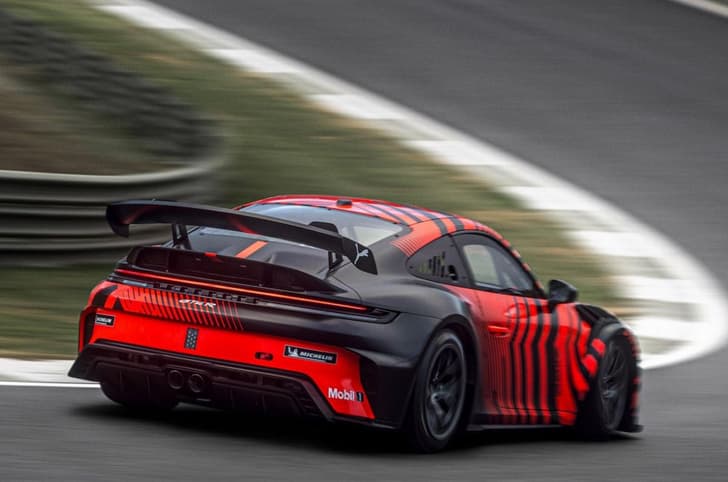Porsche 911 GT4 R rear three quarter tracking