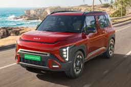 kia syros ev on road