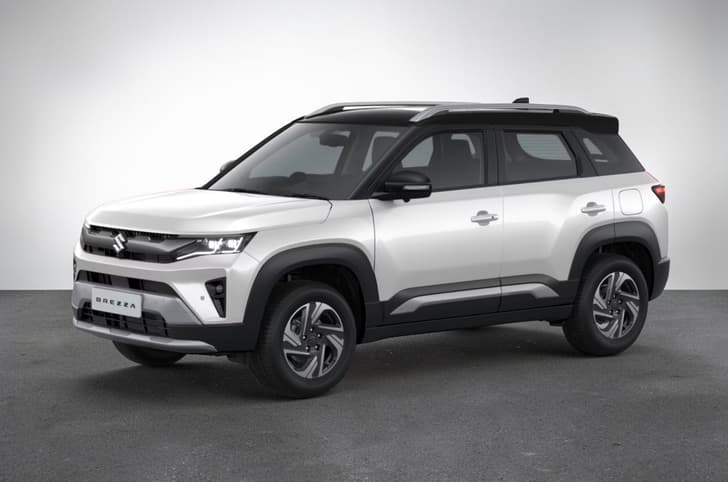 2026 Maruti Brezza Pearl Arctic White with Bluish Black Roof.