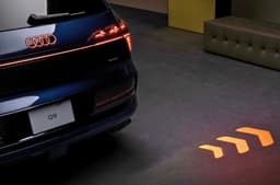 Audi Q9 LED turn indicator projection on road image