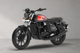 Front left quarter of the Jawa 42 FJ in All Stars Matte Black (Red Clad) colour.