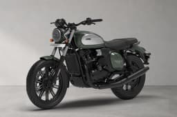 Front left quarter of the Jawa 42 FJ in All Stars Aurora Green colour.