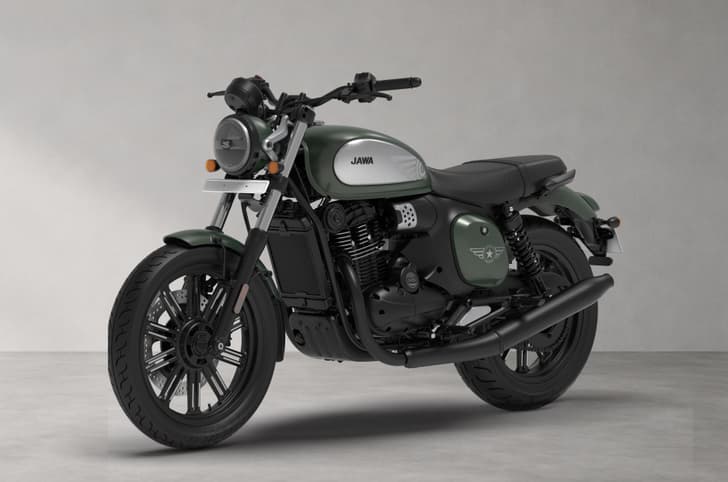 Front left quarter of the Jawa 42 FJ in All Stars Aurora Green colour.