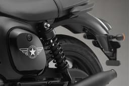 Close up shot of the left rear suspension and seat on the Jawa 42 FJ All Stars Edition